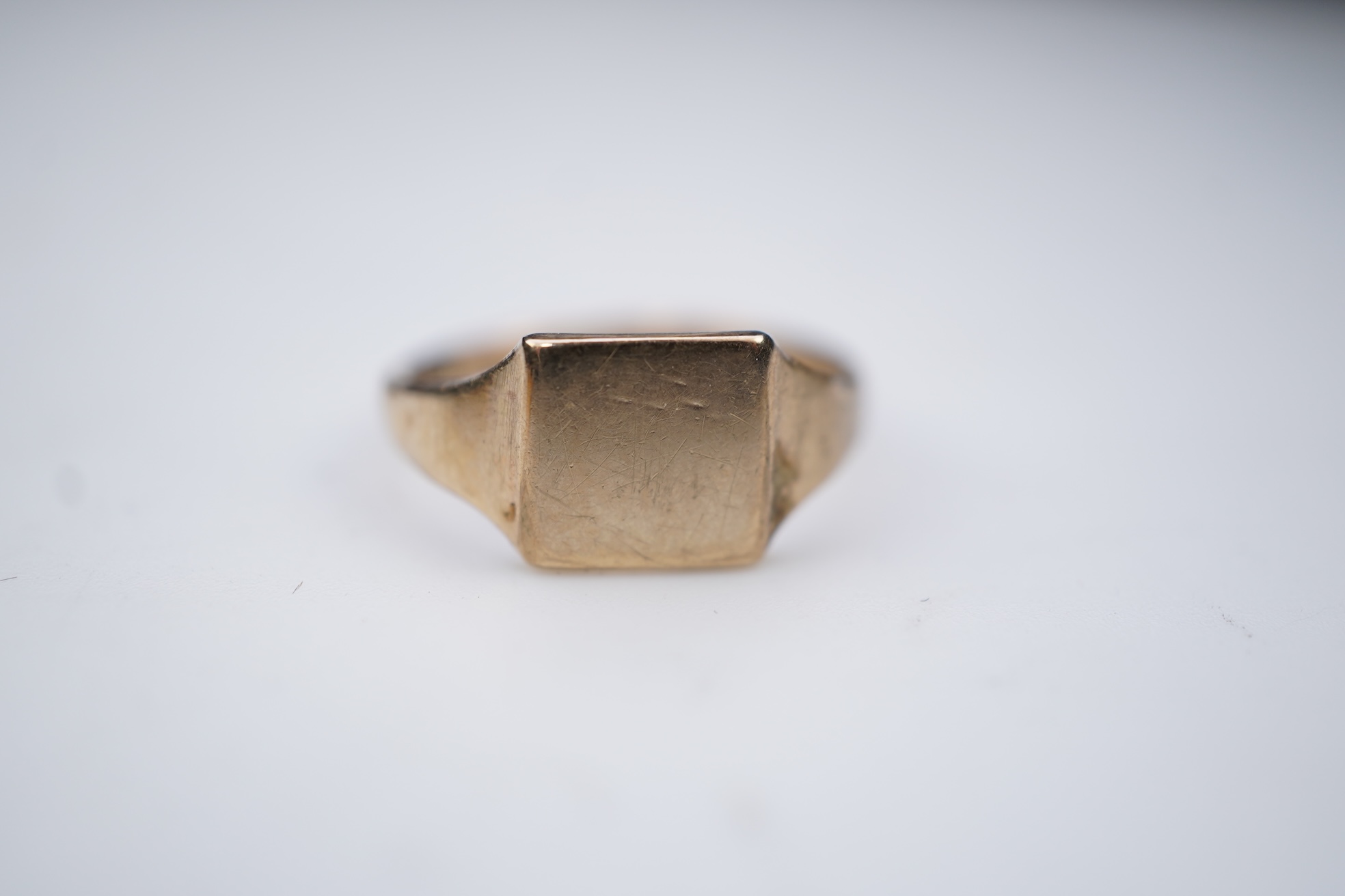 A collection of seven gold rings
